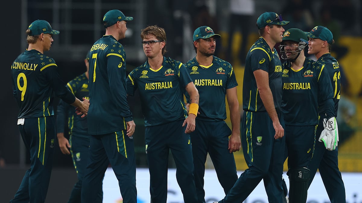 Australia cricketers celebrating a wicket against Ireland in ICC T20 World Cup 2026 Group B encounter.  - T20WorldCup/X