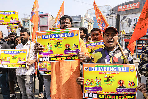 Activists of the Bajrang Dal stage a protest holding placards demanding a ban on Valentine's Day celebrations and observe February 14 as Veer Jawan Diwas to pay tributes to CRPF personnel killed in the 2019 Pulwama terror attack, in Hyderabad.