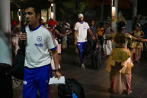 India's head coach Gautam Gambhir, front left, Washington Sundar being welcomed with a performance by artistes upon their arrival at the airport, ahead of an ICC Men's T20 World Cup 2026 cricket match between India and Pakistan, in Colombo, Sri Lanka.