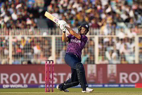 Scotland's Oliver Davidson plays a shot during the T20 World Cup cricket match between England and Scotland in Kolkata, India.