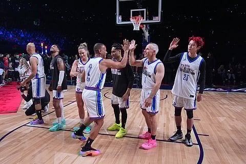 Team Giannis players are introduced at an NBA basketball's All-Star Celebrity Game in Inglewood, Calif.
