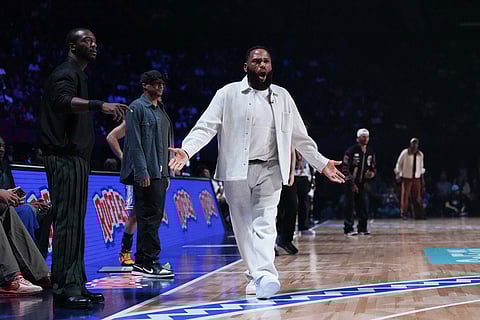 Coach Anthony Anderson reacts to a play during an NBA basketball's All-Star Celebrity Game in Inglewood, Calif.