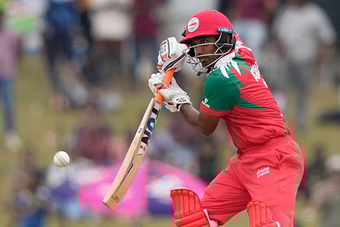 Oman's Syed Aamir Kaleem plays a shot during the T20 World Cup cricket match between Ireland and Oman in Colombo, Sri Lanka.