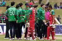 Ireland Vs Oman, ICC T20 World Cup 2026: Lorcan Tucker And Gareth Delany Shine As IRE Rout OMN By 93 Runs | Photo: AP/Eranga Jayawardena : Ireland's players shake hands with Oman's players after they won the T20 World Cup cricket match against Oman in Colombo, Sri Lanka.