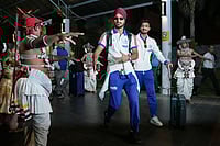 ICC T20 World Cup 2026: Indian Team Touches Down In Colombo Ahead Of Sunday’s IND Vs PAK Contest | Photo: PTI/Arun Sharma : India's Arshdeep Singh and Axar Patel dance as they are being welcomed with a performance by artistes upon their arrival at the airport, ahead of an ICC Men's T20 World Cup 2026 cricket match between India and Pakistan, in Colombo, Sri Lanka.