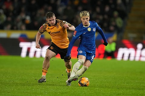 Hull City's Regan Slater guards Chelsea's Alejandro Garnacho during the English FA Cup fourth round soccer match between Hull City and Chelsea in Hull, England.