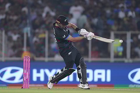 New Zealand's Daryl Mitchell plays a shot during the T20 World Cup cricket match between South Africa and New Zealand in Ahmedabad.=