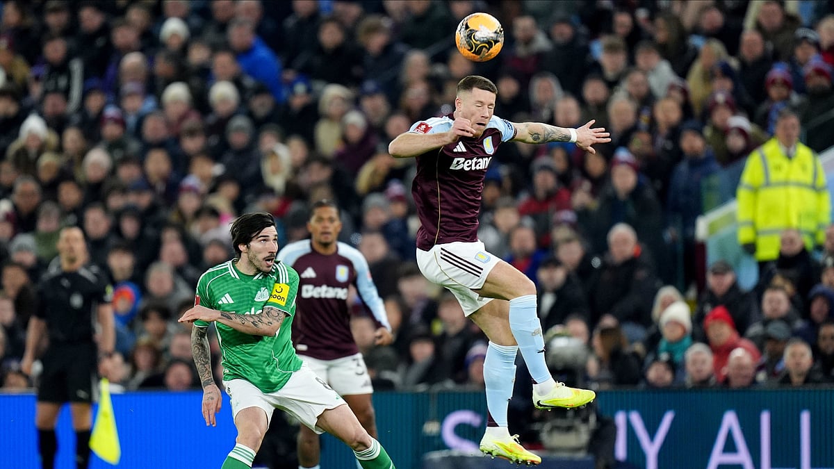 Newcastle United's Sandro Tonali, left, and Aston Villa's Ross Barkley battle for the ball during the English FA Cup fourth round match between Aston Villa and Newcastle United in Birmingham, England, Saturday, Feb. 14, 2026. -  (Jacob King/PA via AP)