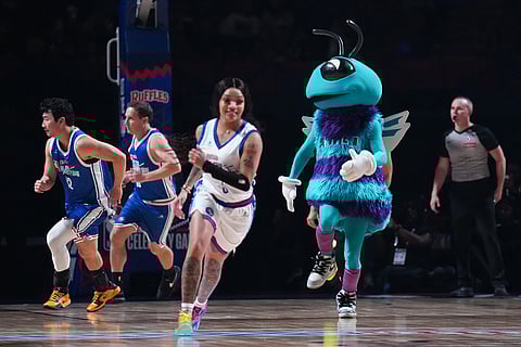 Charlotte Hornets mascot Hugo jogs up the court during an NBA basketball's All-Star Celebrity Game in Inglewood, Calif.
