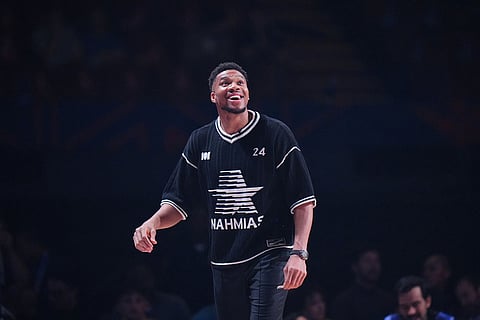 Coach Giannis Antetokounmpo reacts to a play during an NBA basketball's All-Star Celebrity Game in Inglewood, Calif.