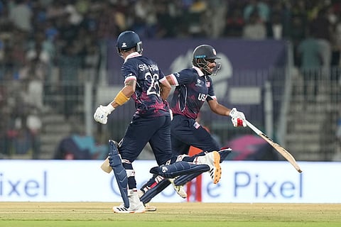 United States' Shubham Ranjane, right, and United States' Saiteja Mukkamala run between the wickets during the T20 World Cup cricket match between Netherlands and United States in Chennai, India.