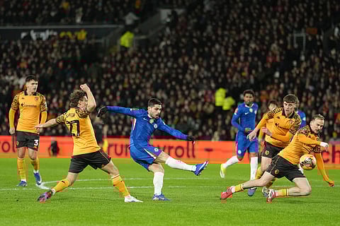 Chelsea's Pedro Neto shoots during the English FA Cup fourth round soccer match between Hull City and Chelsea in Hull, England.