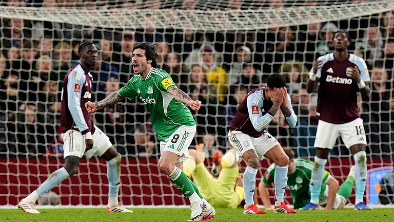 Newcastle United's Sandro Tonali celebrates after scoring his sides first goal during the English FA Cup fourth round match between Aston Villa and Newcastle United in Birmingham, England, Saturday, Feb. 14, 2026. - (Jacob King/PA via AP)