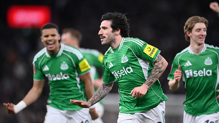 Sandro Tonali celebrates after scoring his second goal against Aston Villa - null