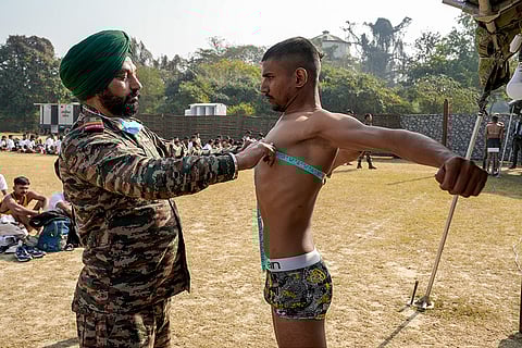 A candidate gets his chest measured during a physical examination for recruitment in the Indian Armed Forces under 'Agnipath' scheme, in Lucknow.
