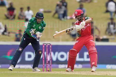 Oman's Hammad Mirza plays a shot during the T20 World Cup cricket match between Ireland and Oman in Colombo, Sri Lanka.