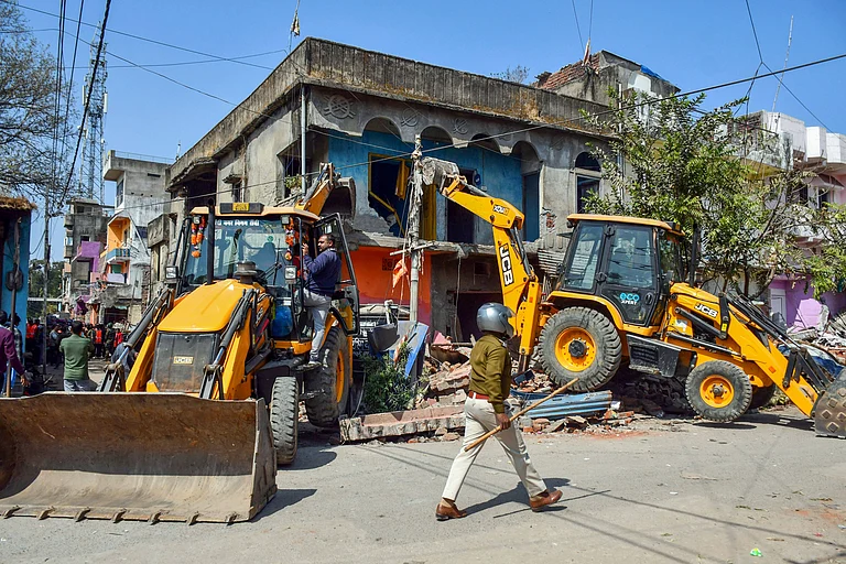 Demolition during an anti-encroachment drive in Ranchi Ranchi, Feb 11 (ANI): A JCB machine demolishes houses during an anti-encroachment drive at Madhukam near Ratu Road, in Ranchi on Wednesday. - IMAGO