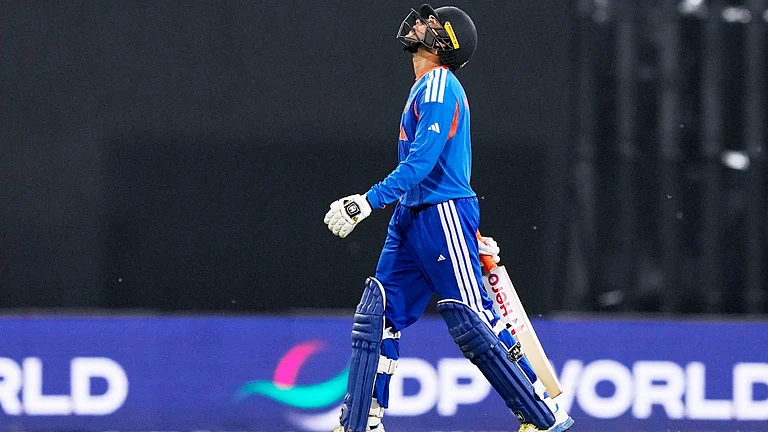 India's Abhishek Sharma reacts as he leaves the ground after losing his wicket during the T20 World Cup cricket match between India and Pakistan in Colombo, Sri Lanka, Sunday, Feb. 15, 2026 - (AP Photo/Eranga Jayawardena)