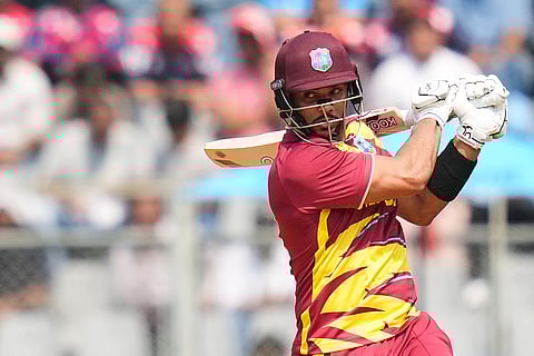 West Indies' Brandon King hits a boundary during the T20 World Cup cricket match between Nepal and West Indies in Mumbai.