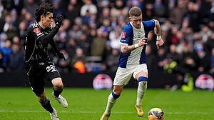 Photo: Jacob King/PA via AP : Leeds United's Ao Tanaka, left, and Birmingham City's Jay Stansfield battle for the ball during the FA Cup fourth round match in Birmingham.