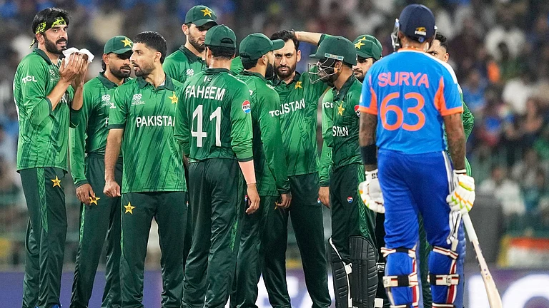 Pakistan 's players wait for the third umpire's decision for the wicket of India's captain Suryakumar Yadav, right, during the T20 World Cup cricket match between India and Pakistan in Colombo, Sri Lanka, Sunday, Feb. 15, 2026 - (AP Photo/Eranga Jayawardena)