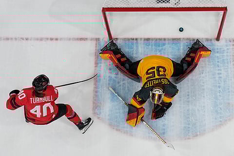 Canada's Blayre Turnbull (40) scores her side's fourth goal during a women's quarterfinal ice hockey game between Canada and Germany at the 2026 Winter Olympics, in Milan, Italy.