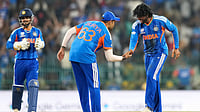ICC T20 World Cup Dispatch: India Vs Pakistan 'Spectacle' Called Out; Zane Green Becomes First Retired Out Batter Eranga Jayawardena : Tilak Varma, right, and captain Suryakumar Yadav celebrate the wicket of Shadab Khan during the T20 World Cup match between India and Pakistan in Colombo, Sri Lanka.