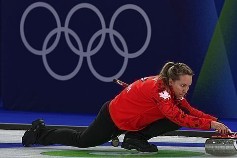 Canada's Rachel Homan in action during the women's curling round robin session against Switzerland at the 2026 Winter Olympics, in Cortina d'Ampezzo, Italy.
