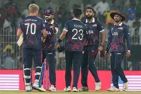 United States' players celebrate after won the T20 World Cup cricket match against Namibia in Chennai.