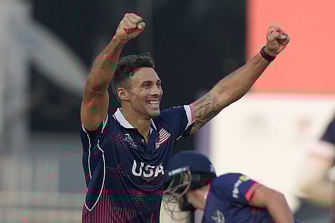 United States' Shadley Van Schalkwyk celebrates the wicket of Namibia's Jan Frylinck during the T20 World Cup cricket match between Namibia and USA in Chennai.