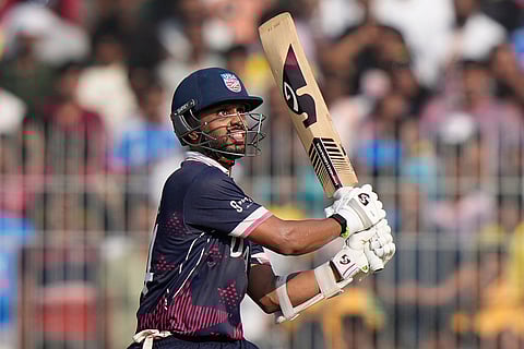 United States' Milind Kumar hits a six during the T20 World Cup cricket match between Namibia and USA in Chennai.