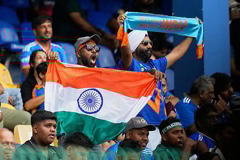 India's fan wait for the T20 World Cup cricket match between India and Pakistan to begin in Colombo, Sri Lanka.