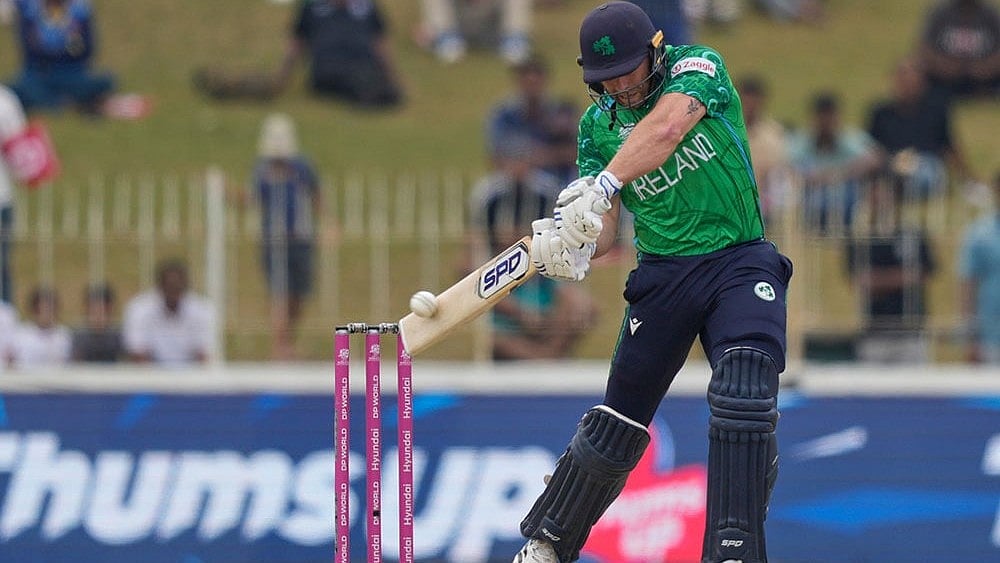 Ireland's Ross Adair plays a shot during the T20 World Cup cricket match between Ireland and Oman in Colombo, Sri Lanka. - | Photo: AP/Eranga Jayawardena