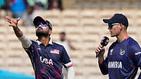 USA Vs Namibia Live Streaming, T20 World Cup 2026: United States Batting First - Check Playing XIs (AP Photo/Mahesh Kumar A.) : United States' captain Monank Patel, left, toss a coin as Namibia's captain Gerhard Erasmus watch during the T20 World Cup cricket match between Namibia and USA in Chennai, India, Sunday, Feb. 15, 2026