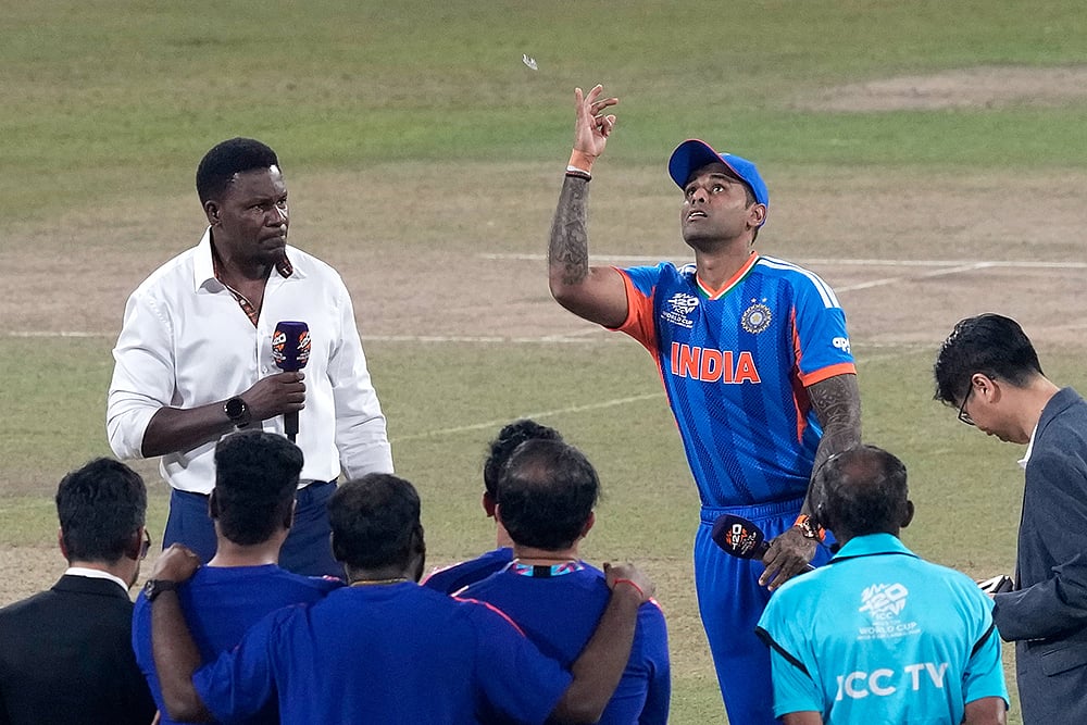 India's captain Suryakumar Yadav tosses the coin before the start of the T20 World Cup cricket match between India and Pakistan in Colombo, Sri Lanka. - | Photo: AP/Eranga Jayawardena