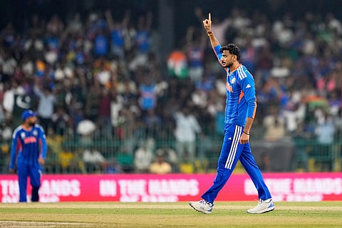 India's Axar Patel celebrates the wicket of Pakistan's Usman Khan during the T20 World Cup cricket match between India and Pakistan in Colombo, Sri Lanka.