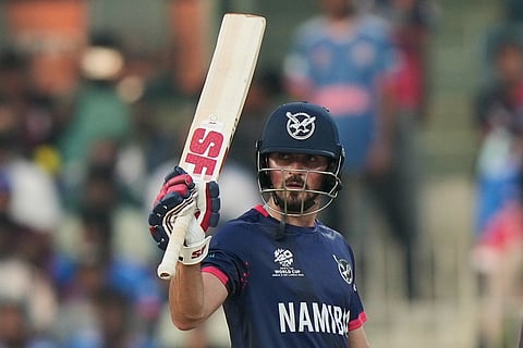 Namibia's Louren Steenkamp celebrates his fifty runs during the T20 World Cup cricket match between Namibia and USA in Chennai.