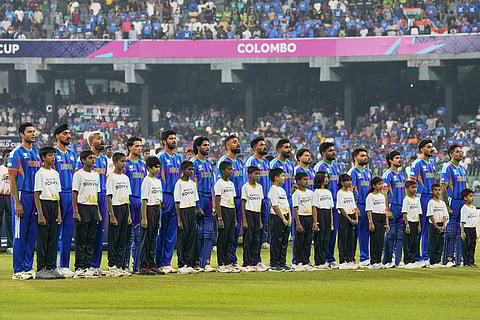 India's players stand up for the national anthems before the start of the T20 World Cup cricket match between India and Pakistan in Colombo, Sri Lanka.