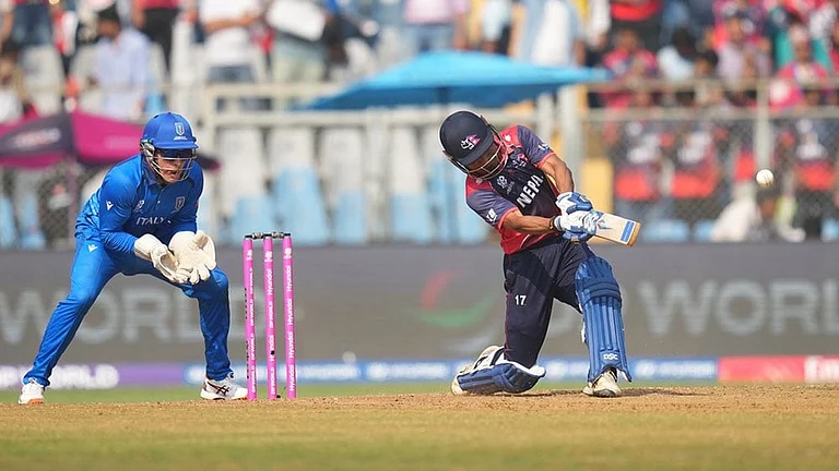 Nepal's captain Rohit Paudel plays a shot during the T20 World Cup cricket match between Italy and Nepal in Mumbai, India. - | Photo: AP/Rafiq Maqbool
