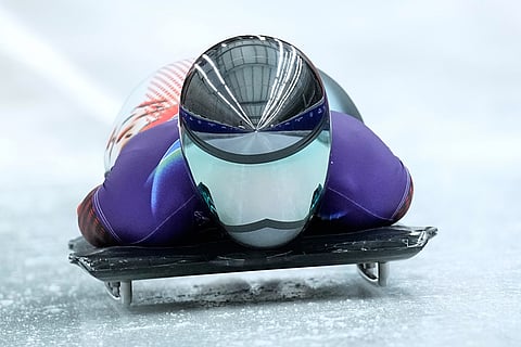 Austria's Janine Flock starts for a women's skeleton run at the 2026 Winter Olympics, in Cortina d'Ampezzo, Italy.
