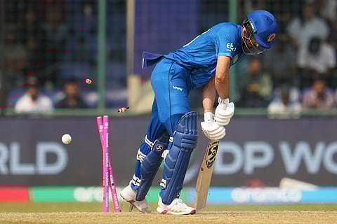 Afghanistan's Sediqullah Atal bowled by United Arab Emirates' Muhammad Jawadullah during the T20 World Cup cricket match between Afghanistan and United Arab Emirates in New Delhi.