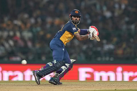 Sri Lanka's Kusal Mendis plays a shot during the T20 World Cup cricket match between Sri Lanka and Australia in Pallekele, Sri Lanka.