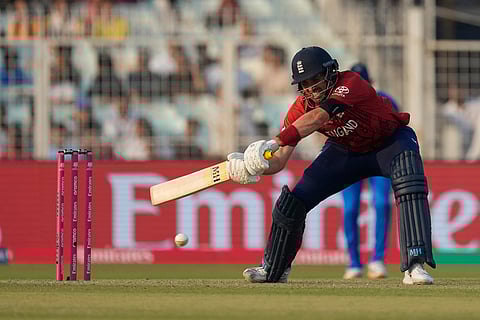 England's Jamie Overton plays a shot during the T20 World Cup cricket match between England and Italy in Kolkata.