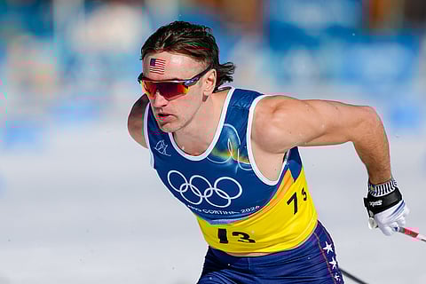 John Steel Hagenbuch, of the United States, competes in the cross country skiing men's 4 x 7.5km relay at the 2026 Winter Olympics, in Tesero, Italy.