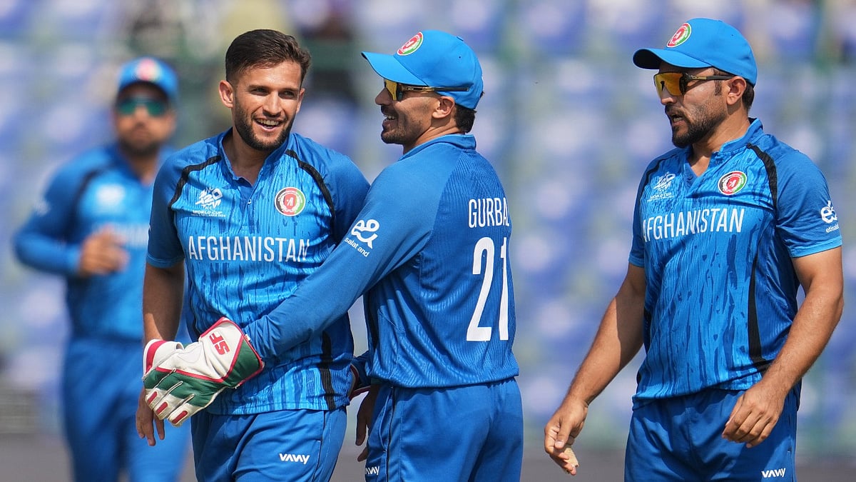 Afghanistan's Azmatullah Omarzai, centre, celebrates the wicket of United Arab Emirates' Syed Haider during the T20 World Cup cricket match between Afghanistan and United Arab Emirates in New Delhi, India, Monday, Feb. 16, 2026. -  (AP Photo/Manish Swarup)
