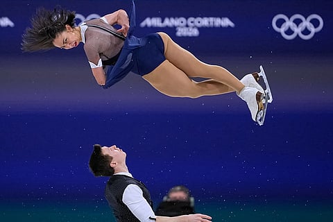 Camille Kovalev and Pavel Kovalev of France compete during the pairs figure skating short program at the 2026 Winter Olympics, in Milan, Italy.