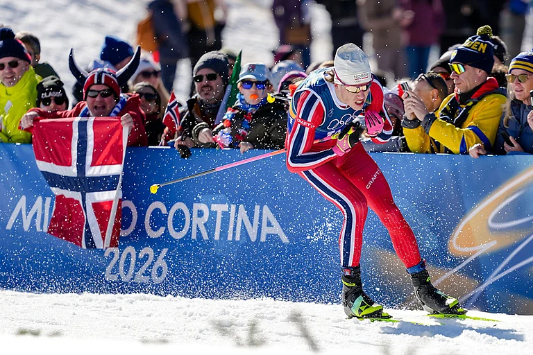 Johannes Hoesflot Klaebo, of Norway, competes in the cross country skiing men's 4 x 7.5km relay at the 2026 Winter Olympics, in Tesero, Italy. - | Photo: AP/Matthias Schrader