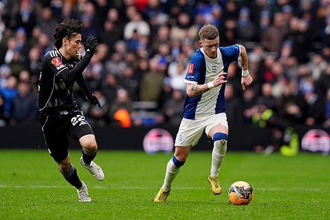 Leeds United's Ao Tanaka, left, and Birmingham City's Jay Stansfield battle for the ball during the Emirates FA Cup fourth round match in Birmingham, England.