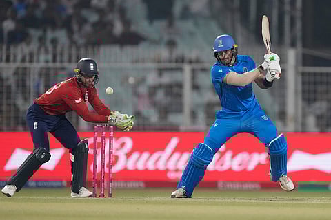 Italy's Grant Stewart plays a shot during the T20 World Cup cricket match between England and Italy in Kolkata, India.