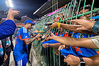 IND Vs PAK, T20 World Cup 2026: India Fans Celebrate Win Over Pakistan With Tricolour And Firecrackers | Photo: PTI/Arun Sharma : India's captain Suryakumar Yadav signs autographs for fans after winning the ICC Men's T20 World Cup 2026 cricket match between India and Pakistan, at R Premadasa Stadium, in Colombo, Sri Lanka.
